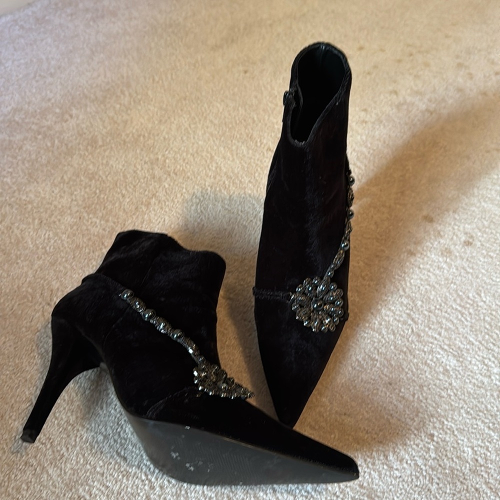 Black velvet booties in size 10.